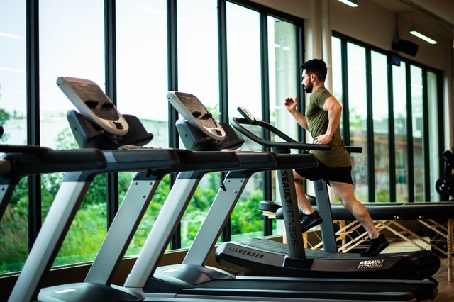 Clean Treadmills with one man running